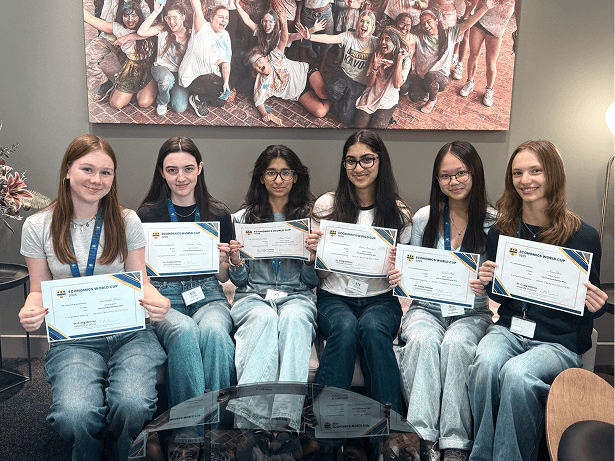 Students from City of London School for Girls holding their EWC certificates