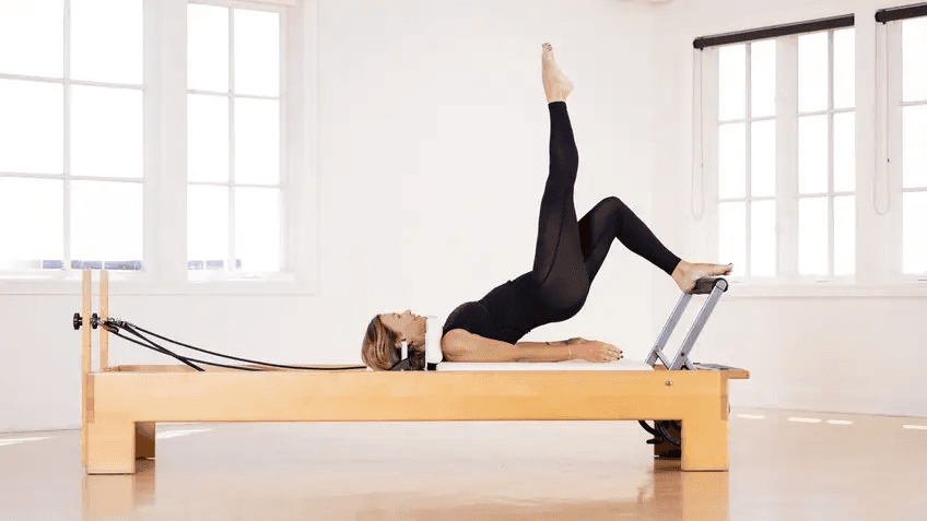 Pilates Reformer Leg Exercises - glute bridge on supine