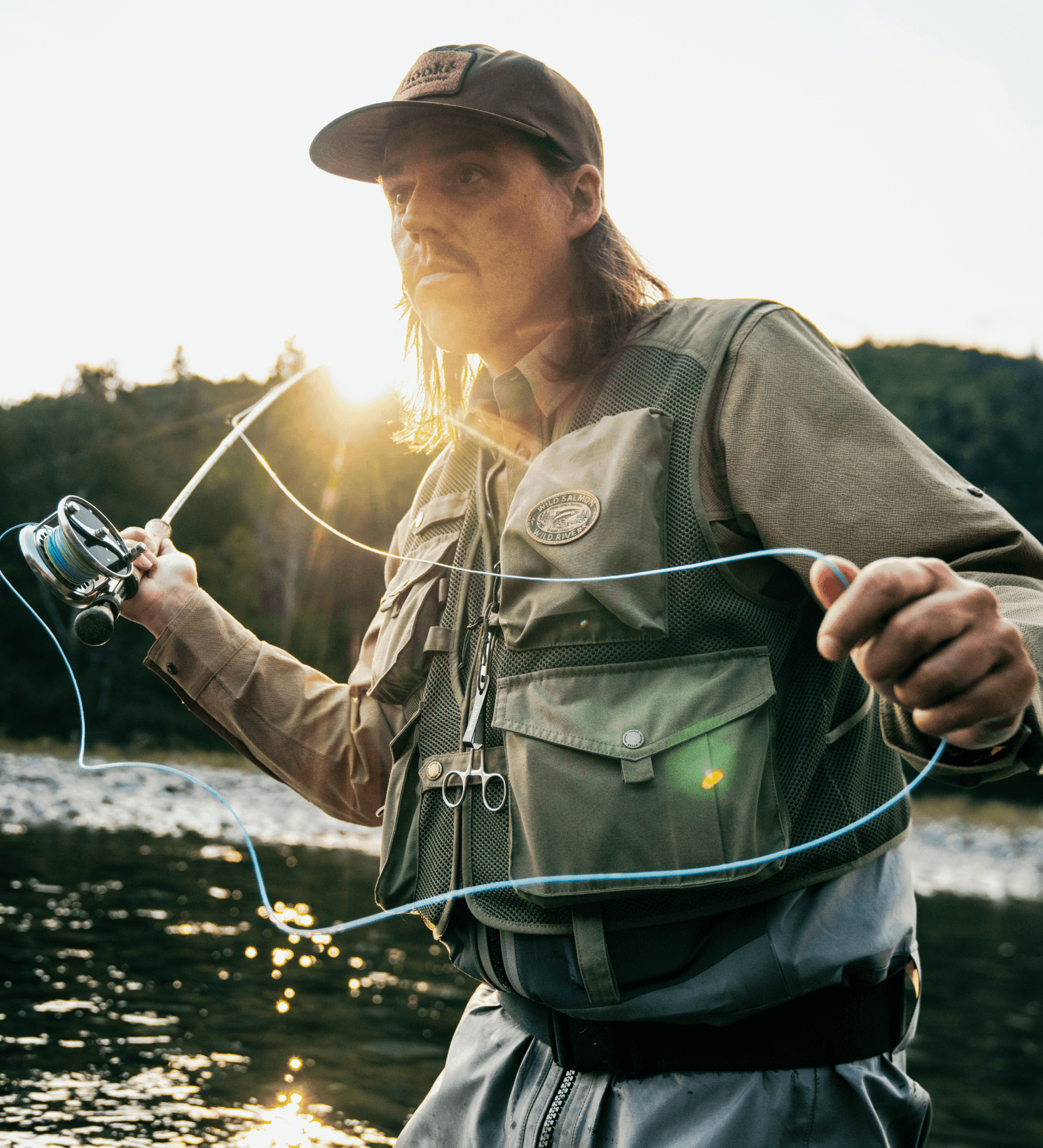 Portrait of Fred Campbell while fly fishing, Hooké CEO and Scale Of Change Film Tour Host.