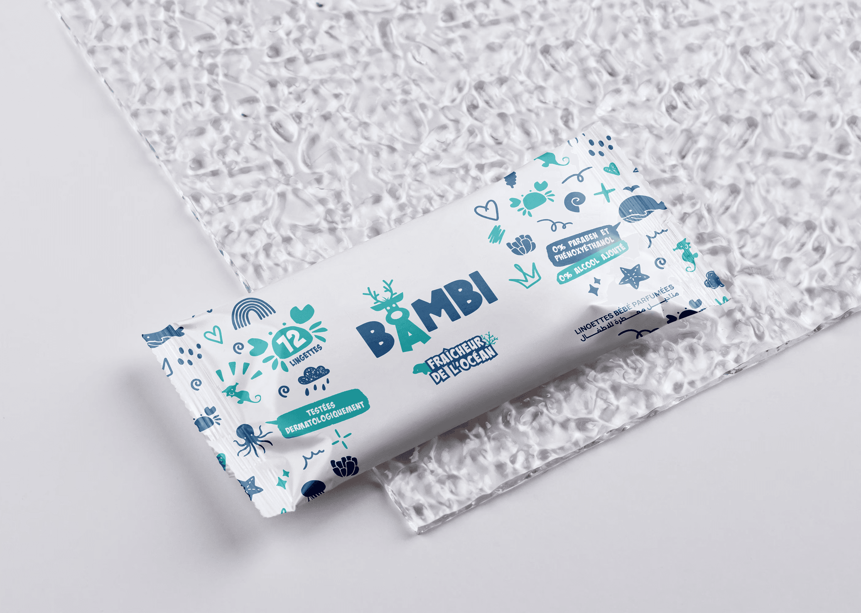 Person wearing black clothing carrying a black tote bag with a green globe-like geometric symbol, standing against a concrete wall in sunlight and shadow.