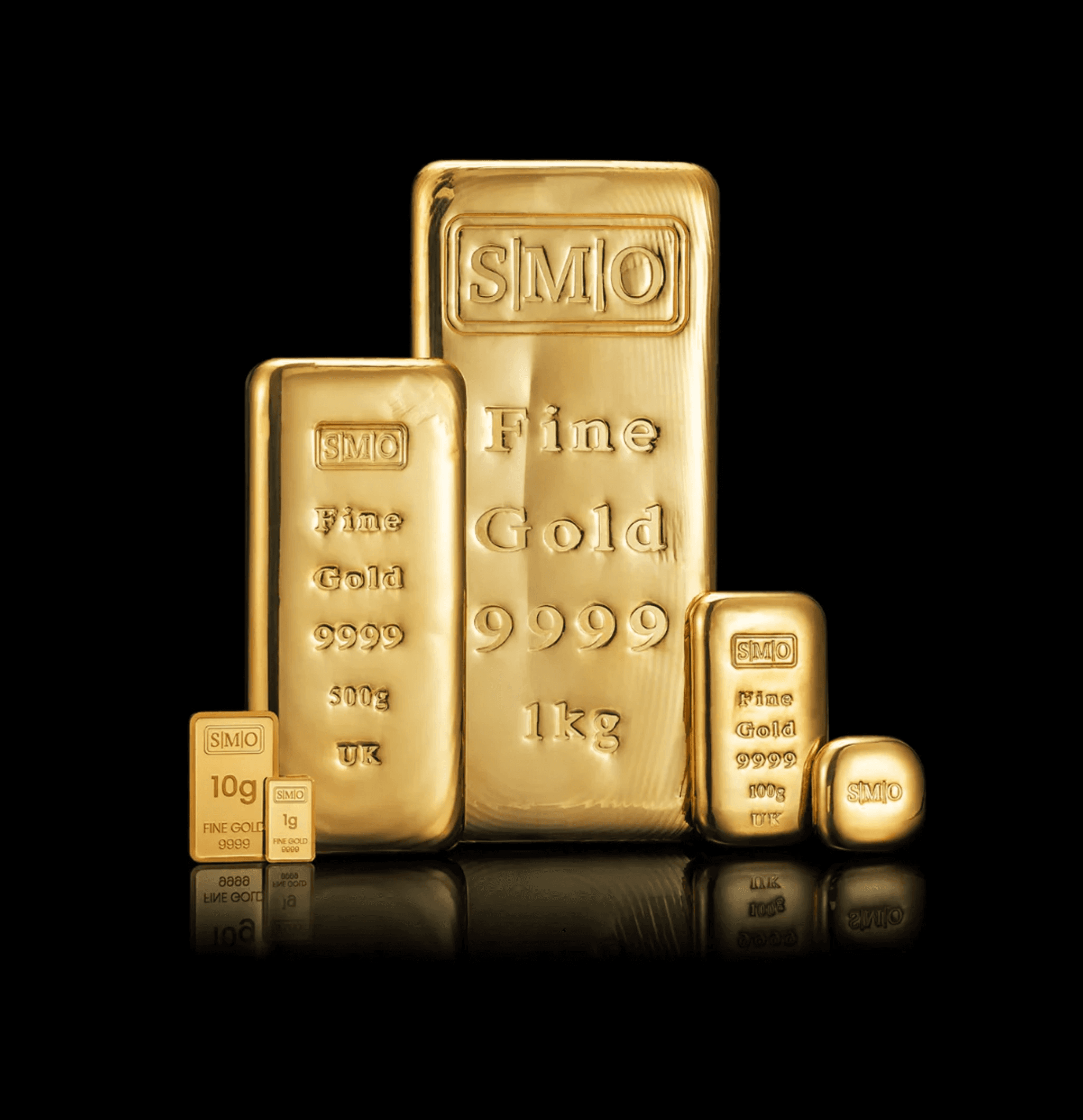 Studio photograph of multiple polished 9999 fine gold bullion bars ranging from 1 gram to 1 kilogram, neatly arranged against a sleek black reflective surface. Each bar is stamped with the "SMO" logo, weight, and purity mark.