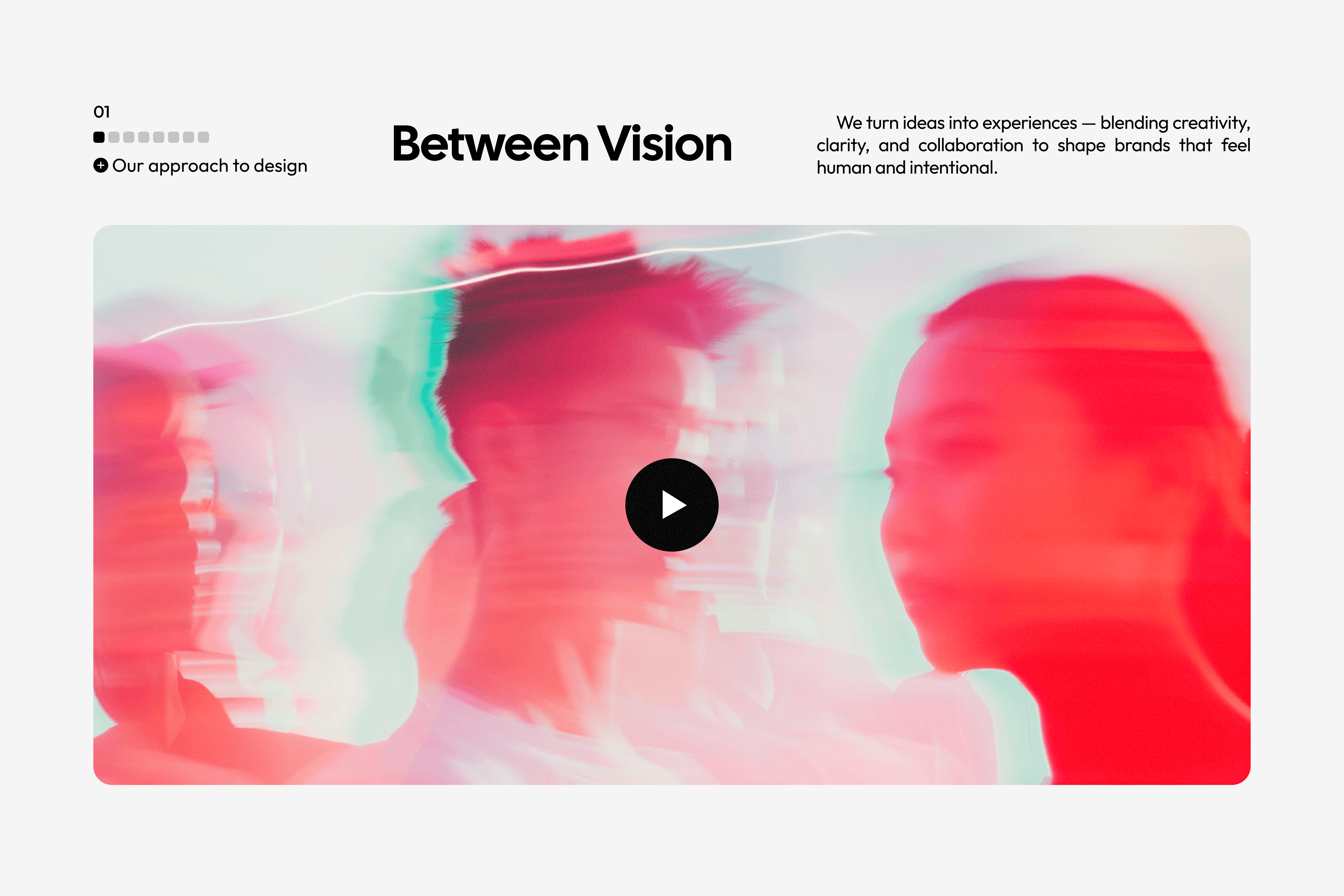 Section titled "Between Vision" featuring a wide video cover image. The image is an abstract double-exposure portrait in red and cyan hues with a central black play button.