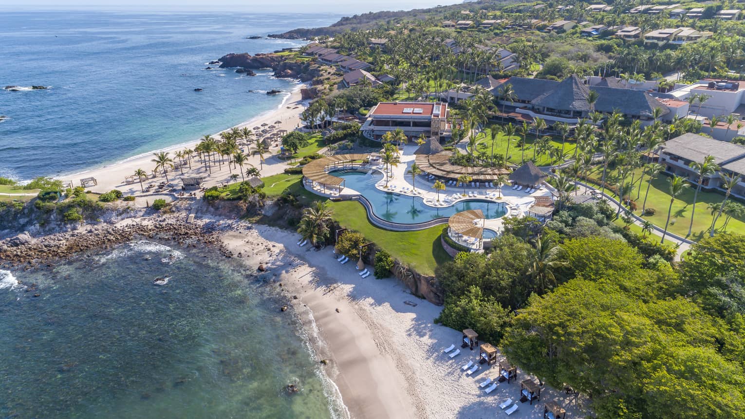 Aerial view of Four Seasons Punta Mita's pools and beaches along the Riviera Nayarit coast.