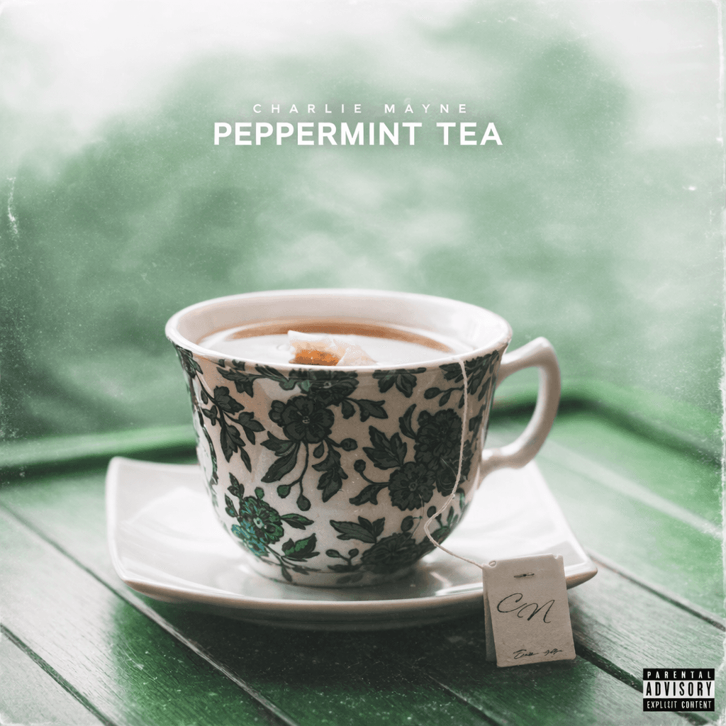 Album artwork for “Peppermint Tea” by Charlie Mayne, Burlington Vermont independent music artist. Featuring a floral teacup on a green table.