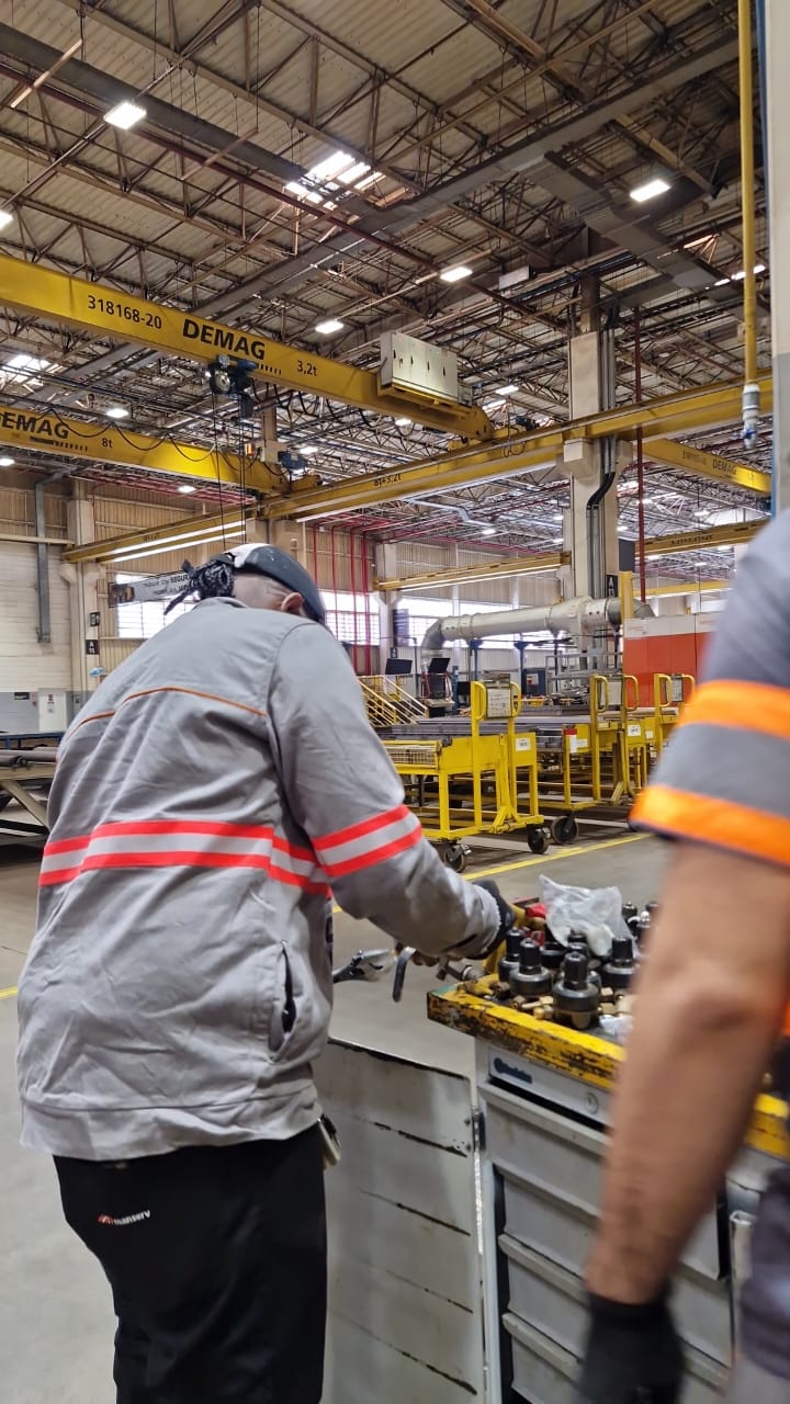 person sitting in a chair in front of a man