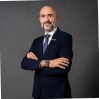 neirouz lahmadi from investia smiling confidently