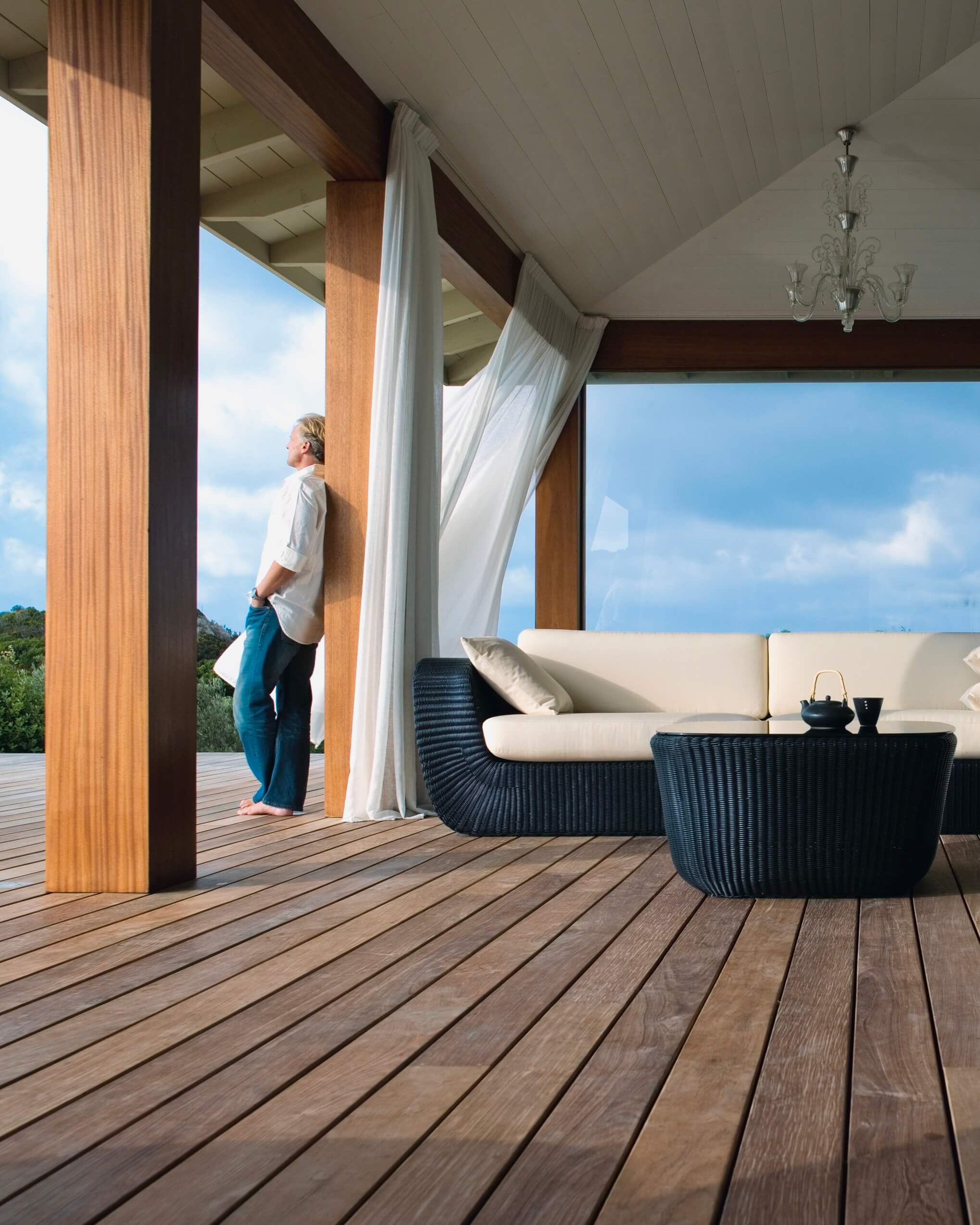 Wooden adventure playground under construction with rope bridges.