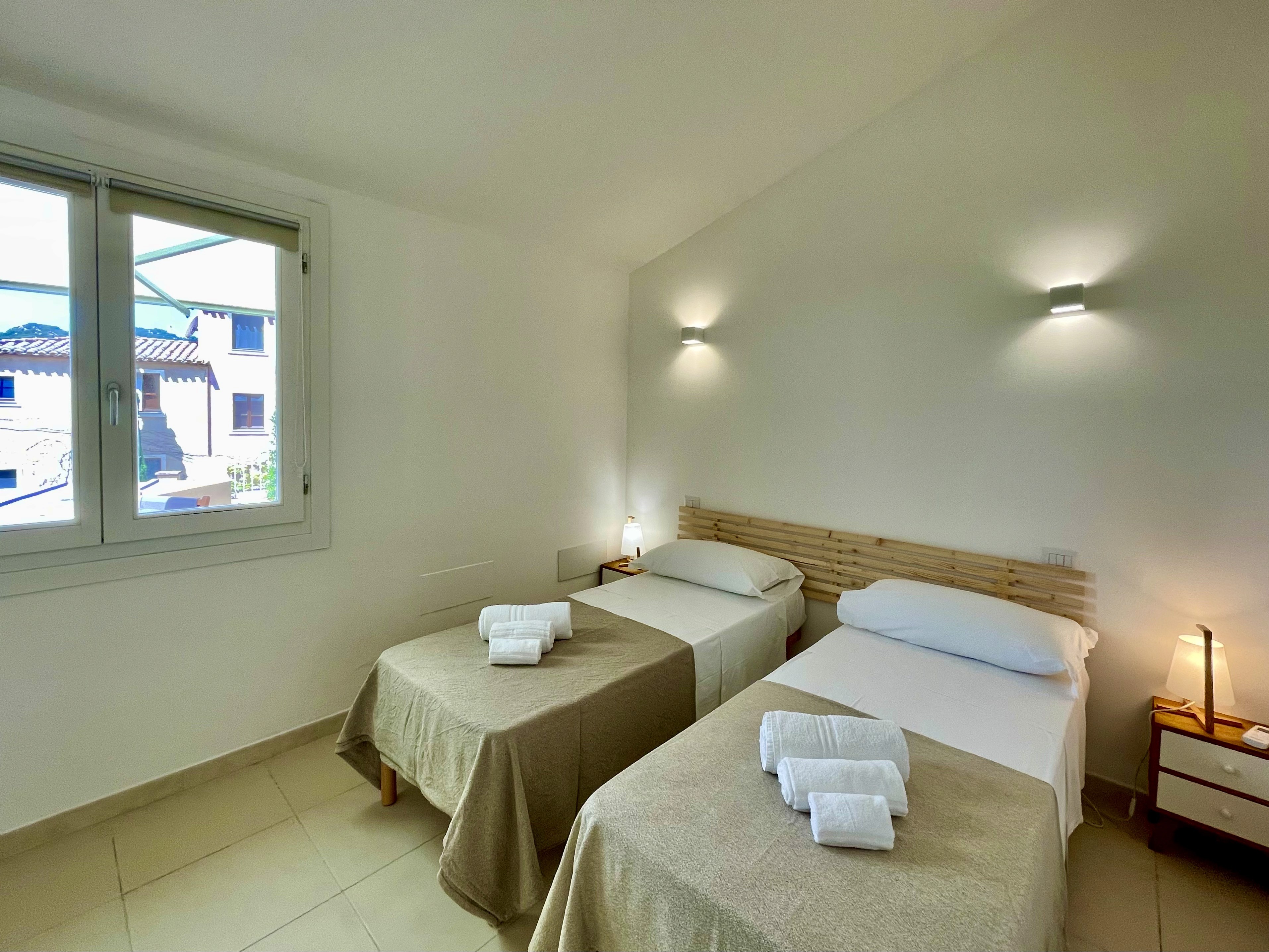 Camera con letti singoli del Trilocale Shardana Standard