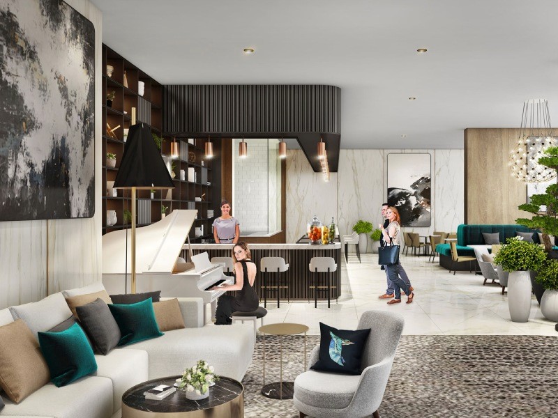 The lobby at North 43 is elegantly decorated with modern furniture, providing a stylish welcome to guests