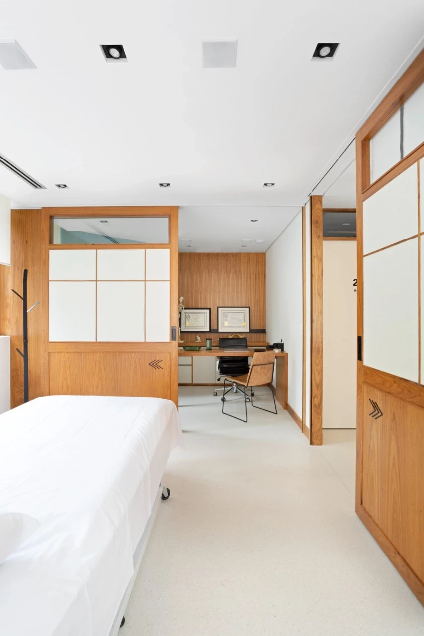 Salle d'oscultation, cloison modulaire bois, design japanisant, calme