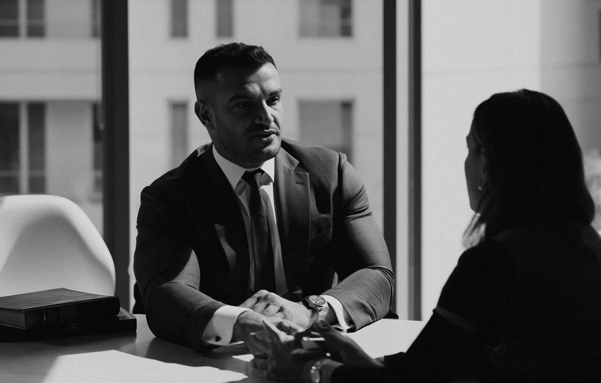 Lawyer speaking to female client