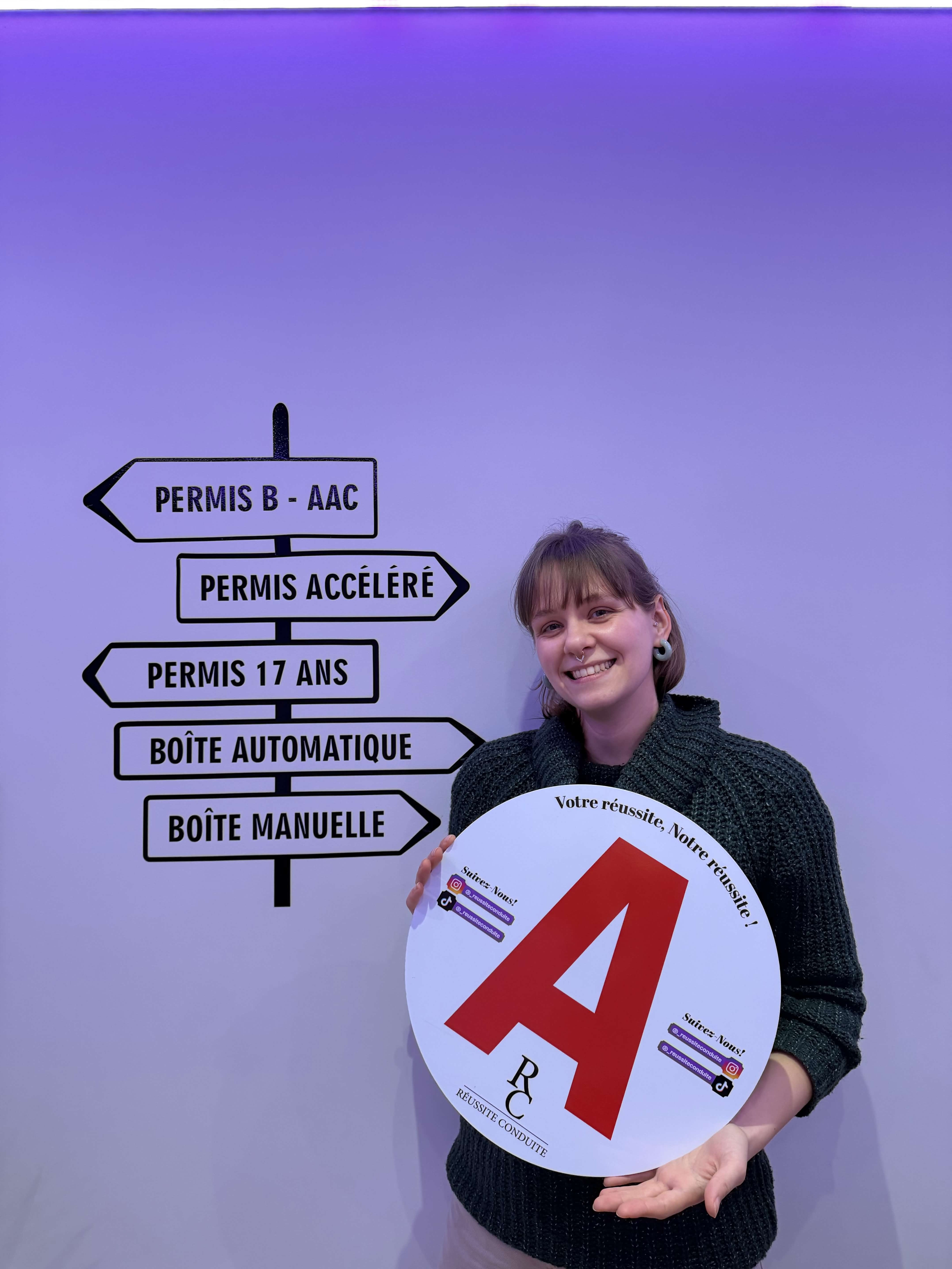 man in black jacket holding blue tablet computer