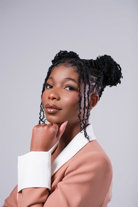 african american woman corporate headshot in photography studio
