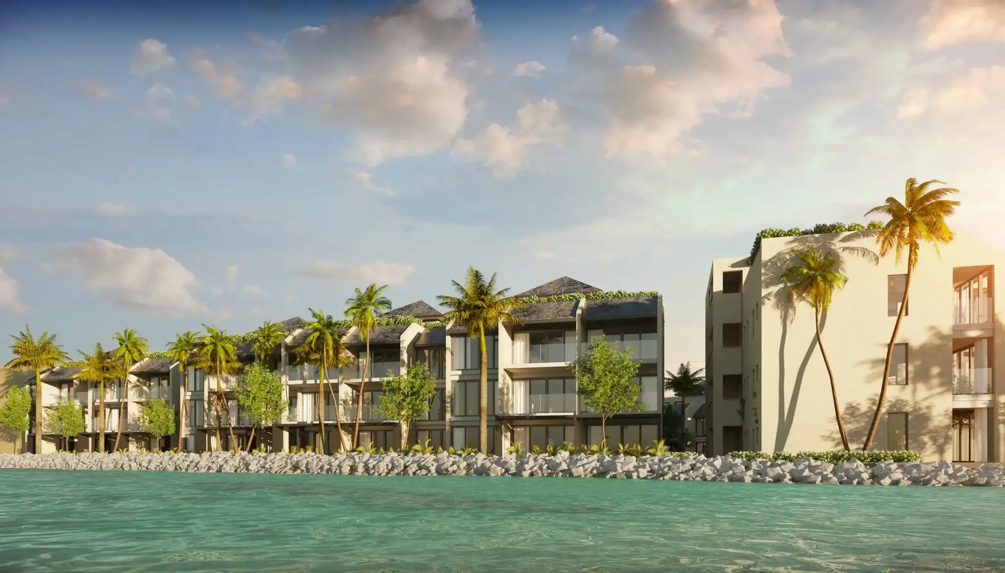 Beachfront resort rendering by Atelier International — multi-building hospitality development with low-rise villas, rooftop gardens, and palm-lined waterfront along a calm tropical shore.