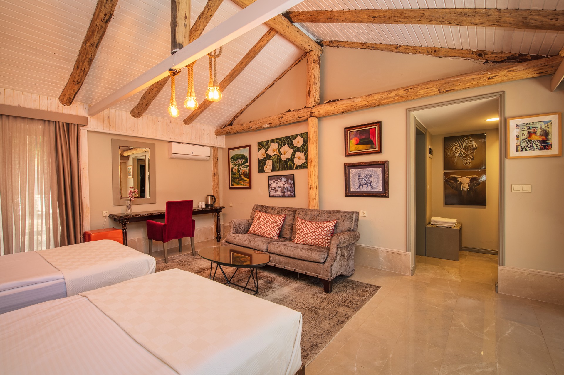 Living area composition, mid-century modern sofa, light wooden coffee table, woven textures, and curated coastal decor.