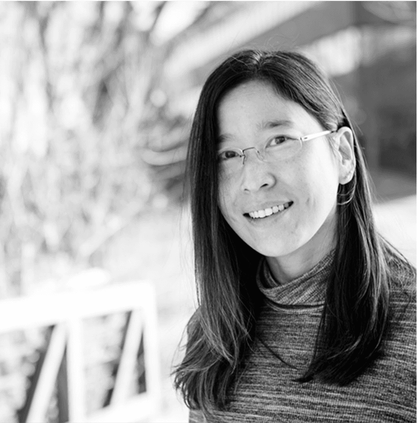 Person pouring Chemical in flask