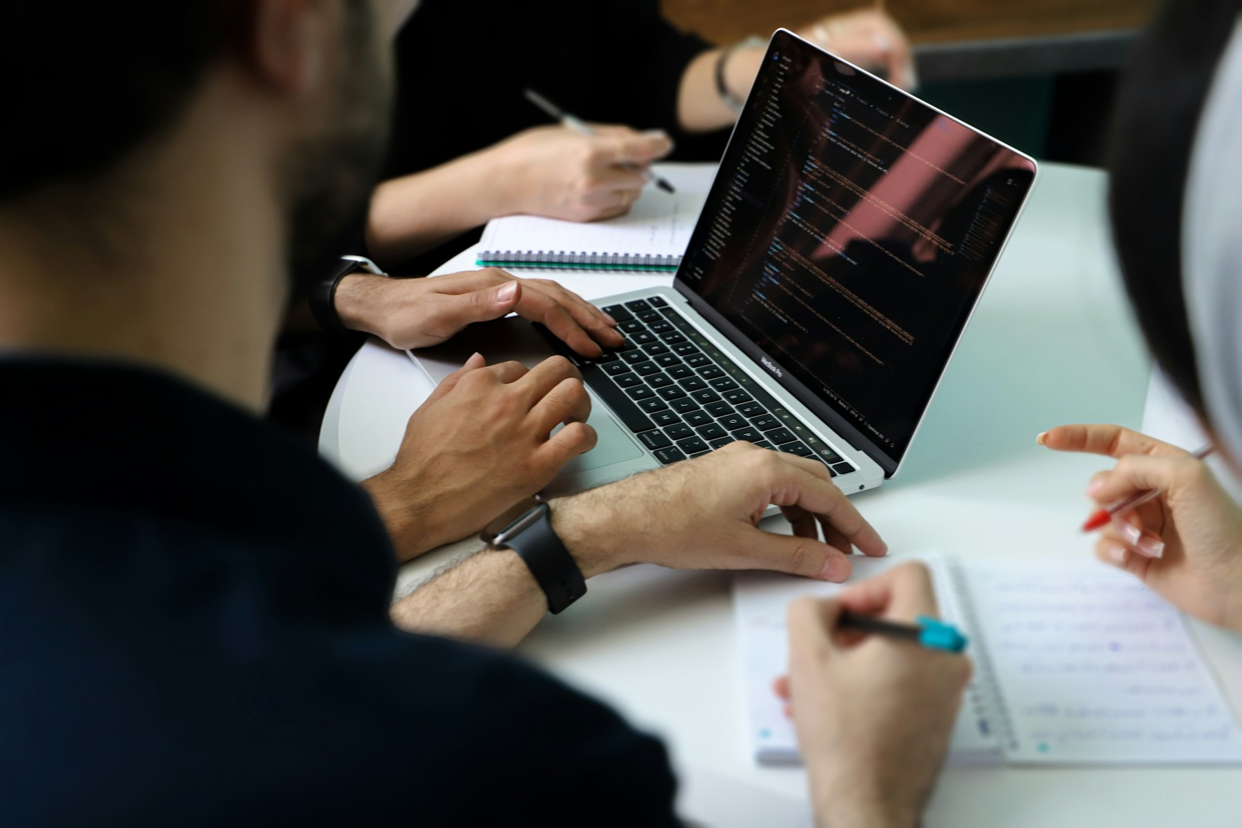 Business team reviewing growth performance together