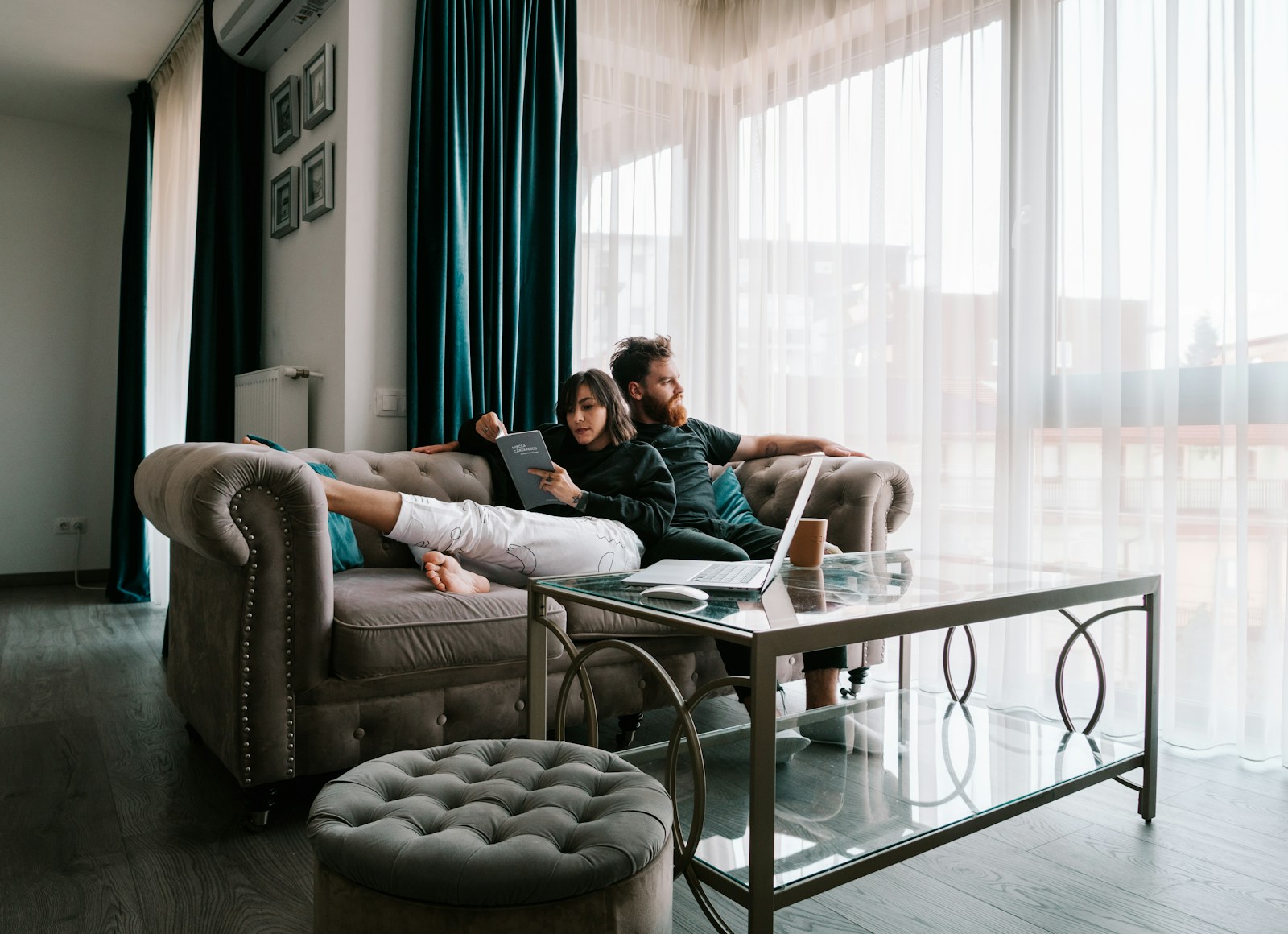 Couple relaxing in a bright living room