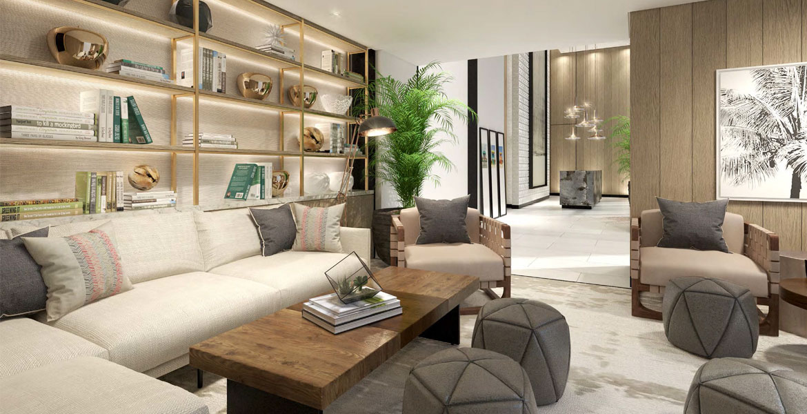 A modern living room featuring a large bookshelf, showcasing a stylish and inviting interior design in Vida Dubai.