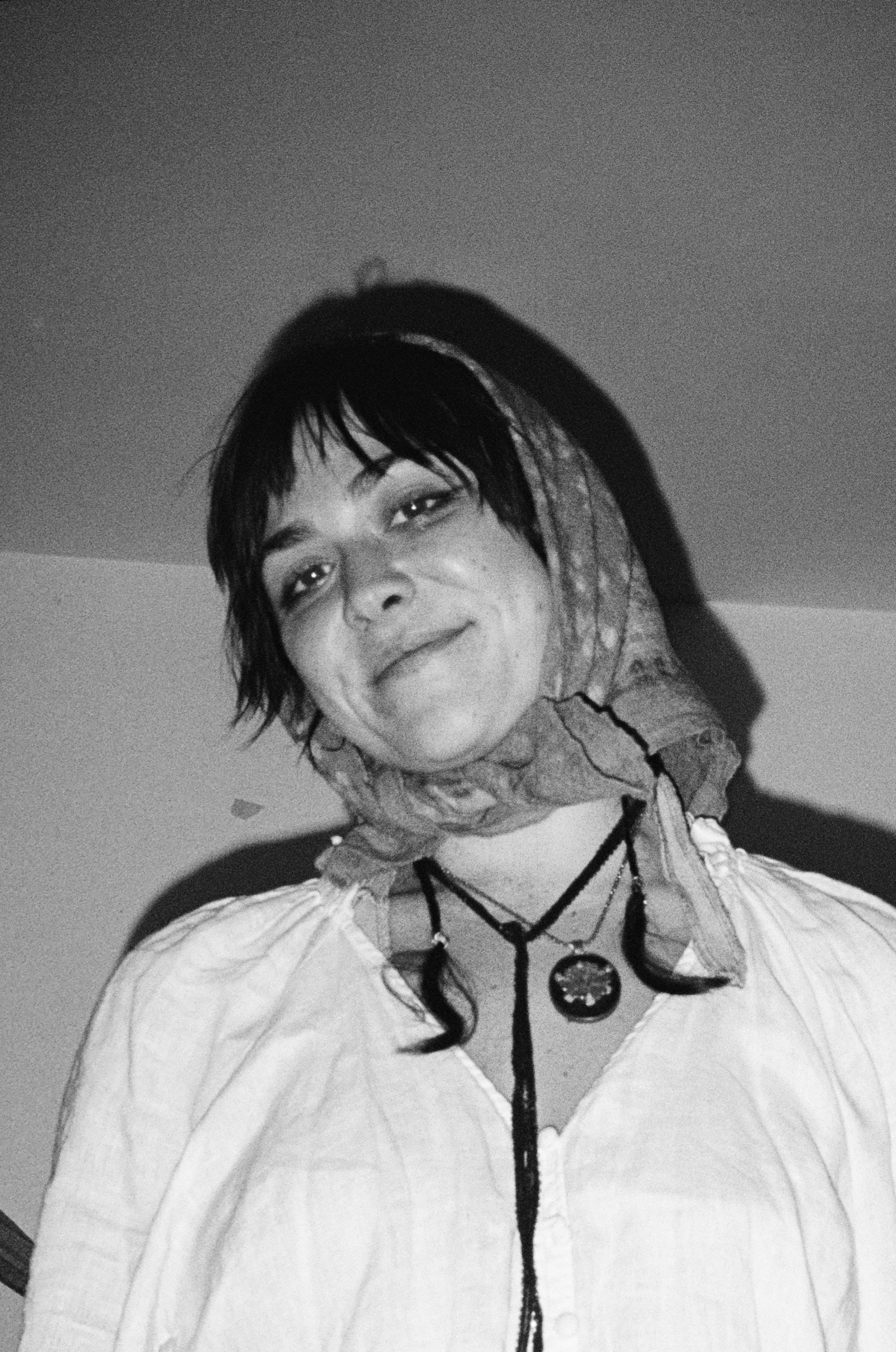 Young woman with eyes closed in a field