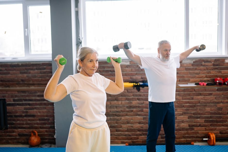 An older adult doing resistance training with dumbbells in a gym setting.