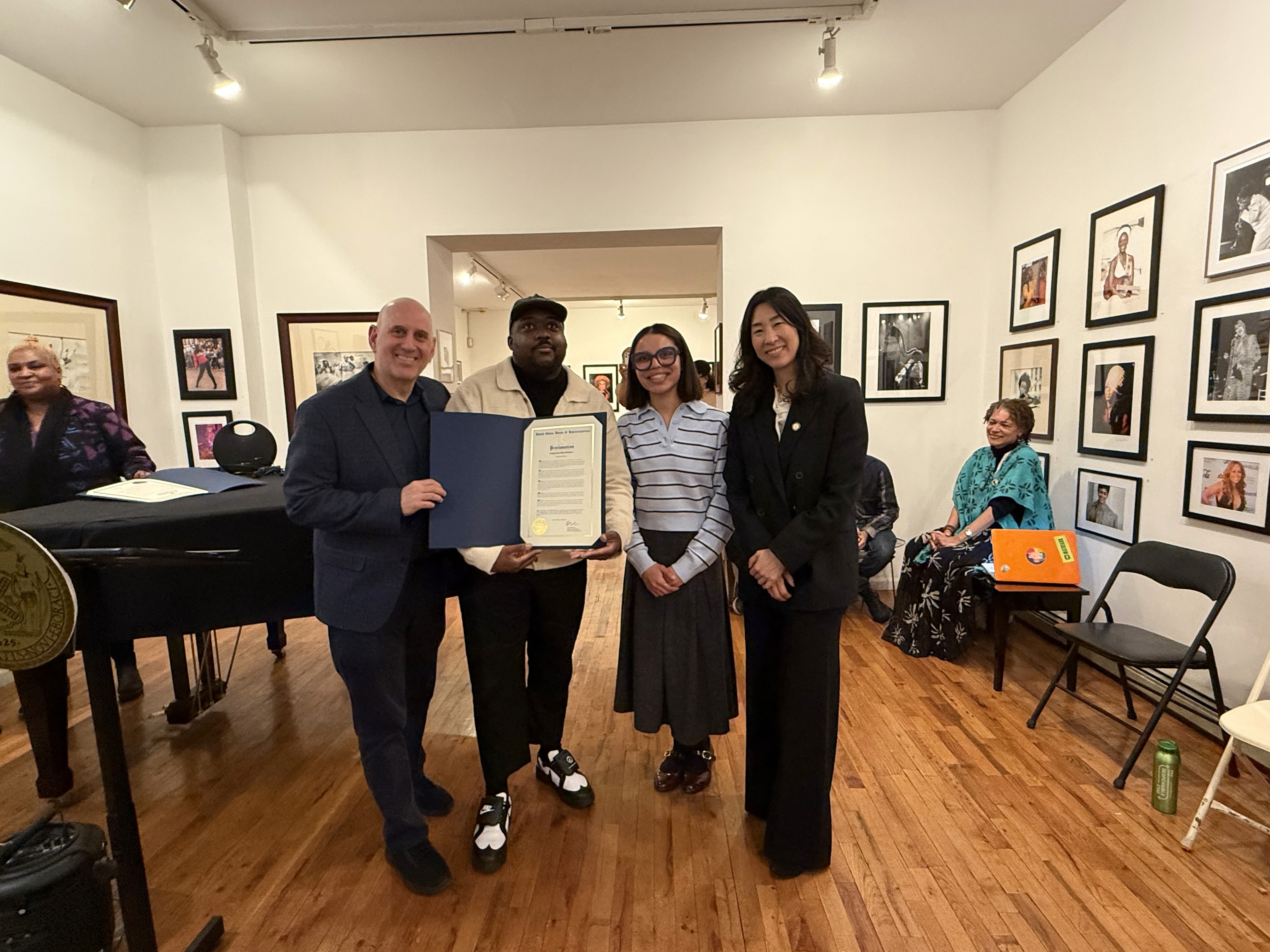 Council Member Harvey Epstein and Assembly member Grace Lee give a proclamation to Maurice Rawls.