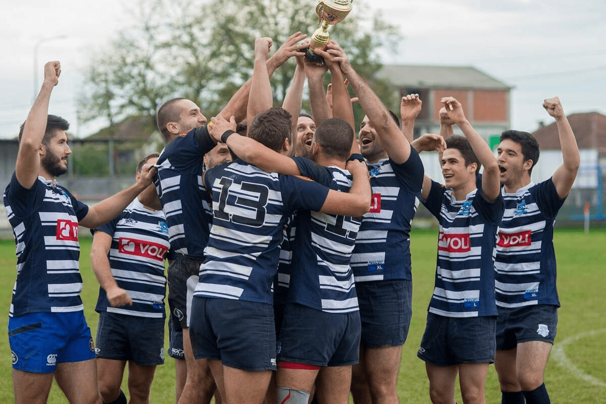 group of rugby players celebrating