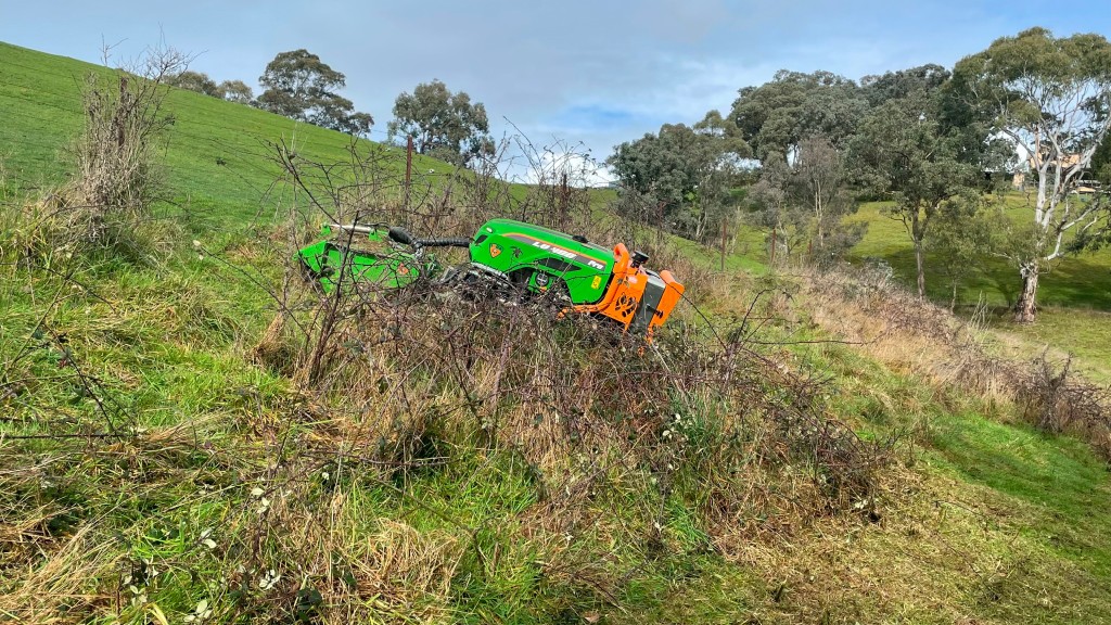 Navigating wet and steep terrain to clear overgrown vegetation