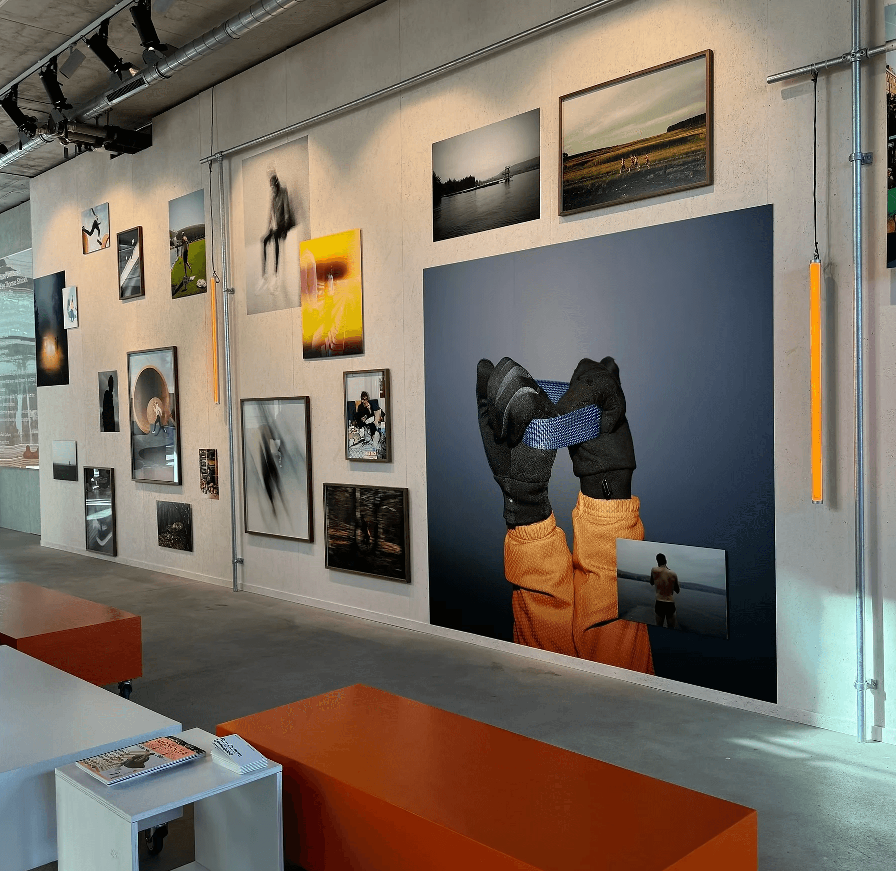 Streetside billboard with flyposters of the Batch.Works brand and illustrations