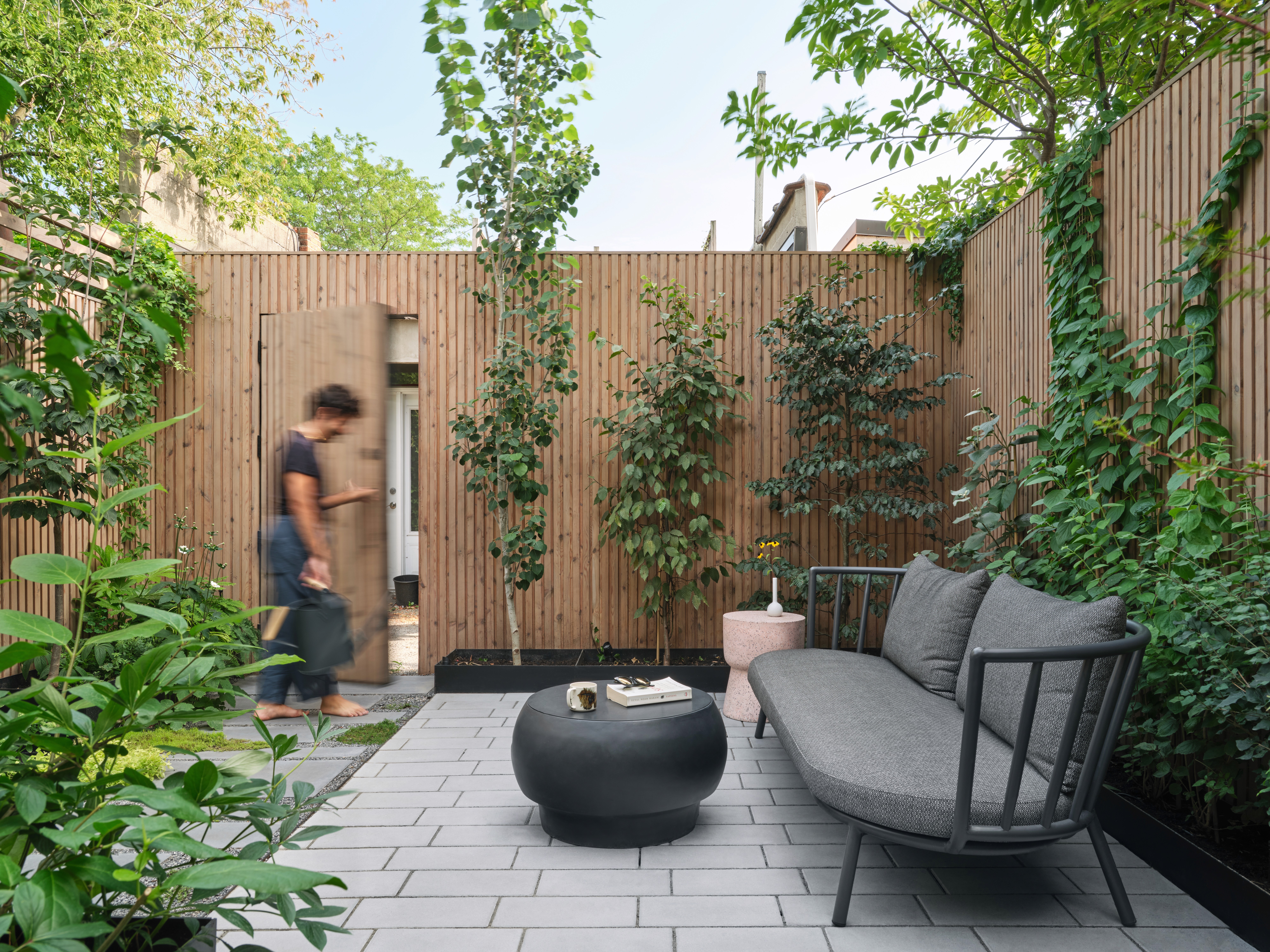 a patio with a couch and a table in it