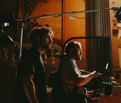 Reilin working with a camera man