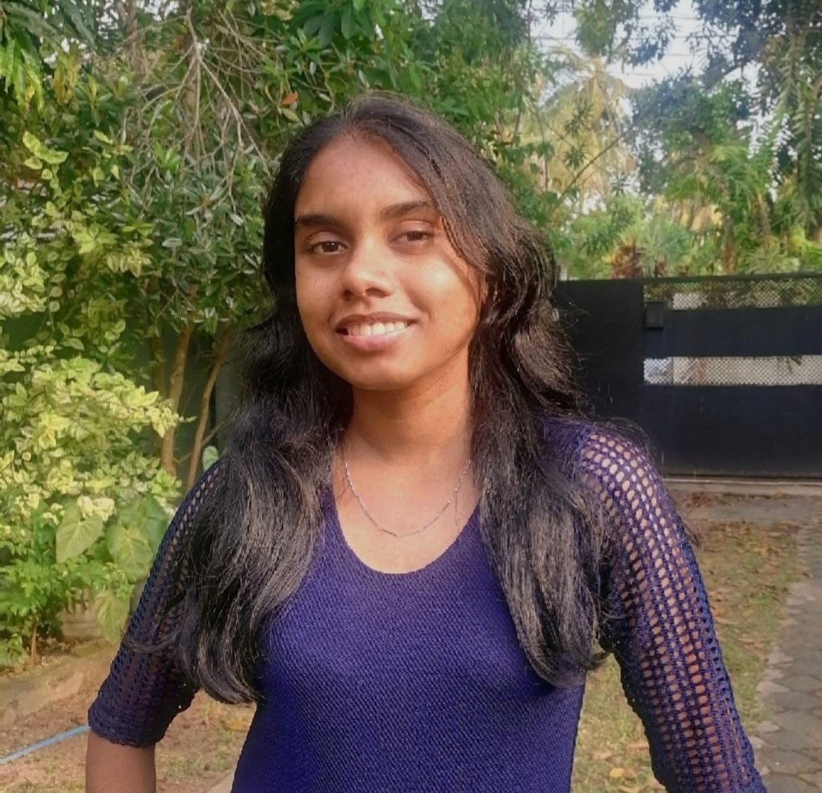 A young girl smiling