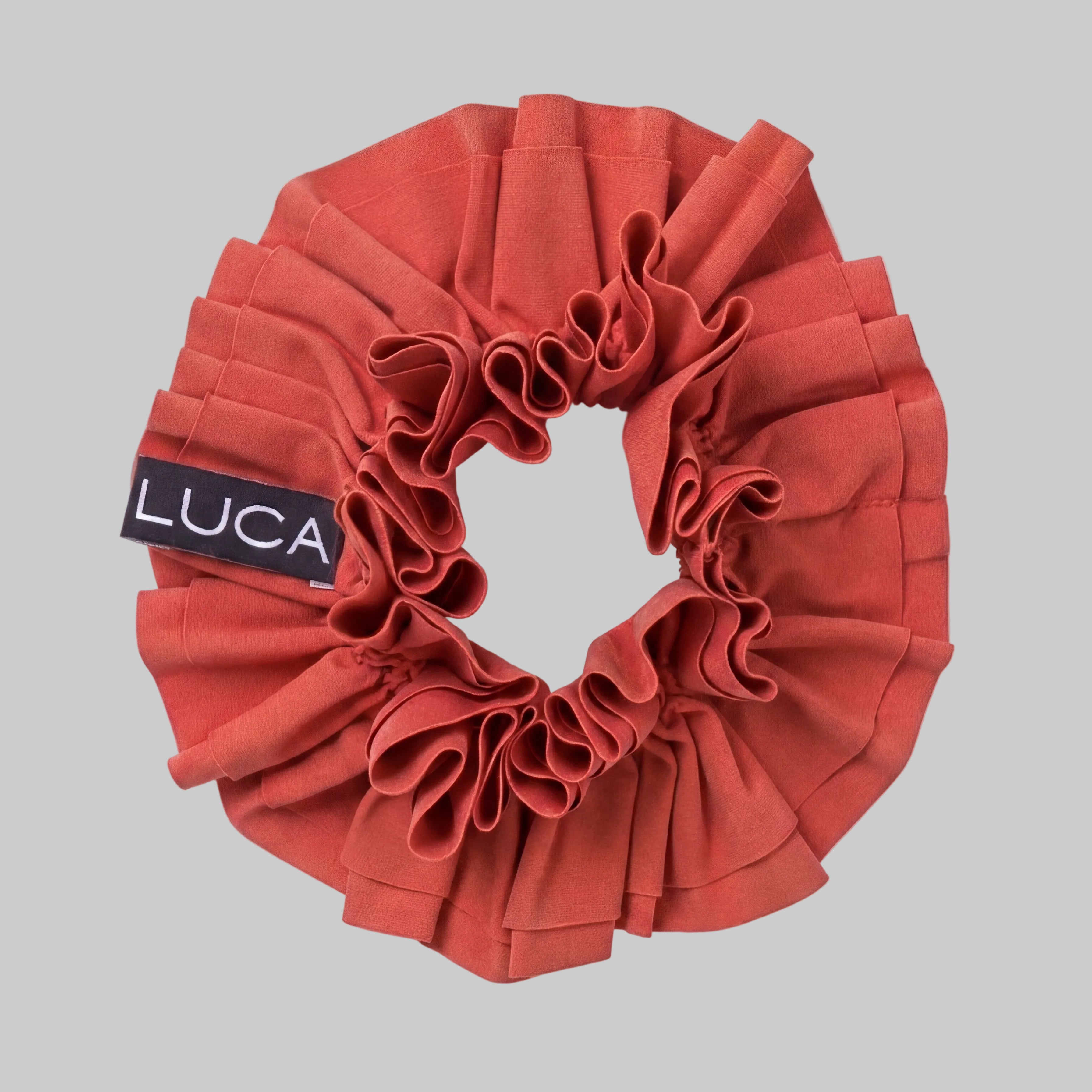 LUCA Uplift Italian fabric hair scrunchie in aperol - flat lay