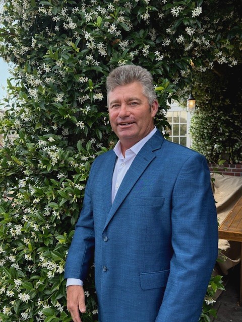 a man in a suit indoors
