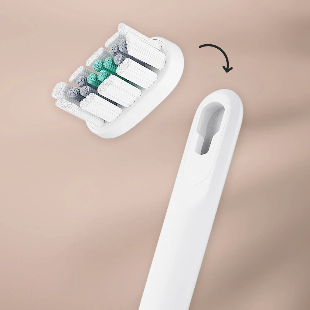 The quip Ultra's puck refill, which replaces the brush head alone.