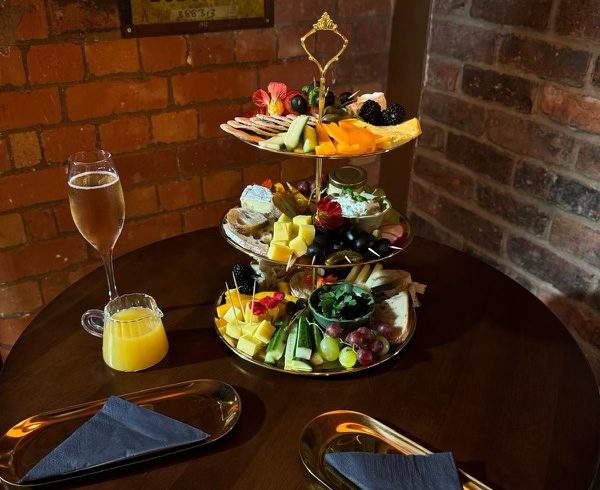 A grazing tower and mimosa on a table at Moonshine