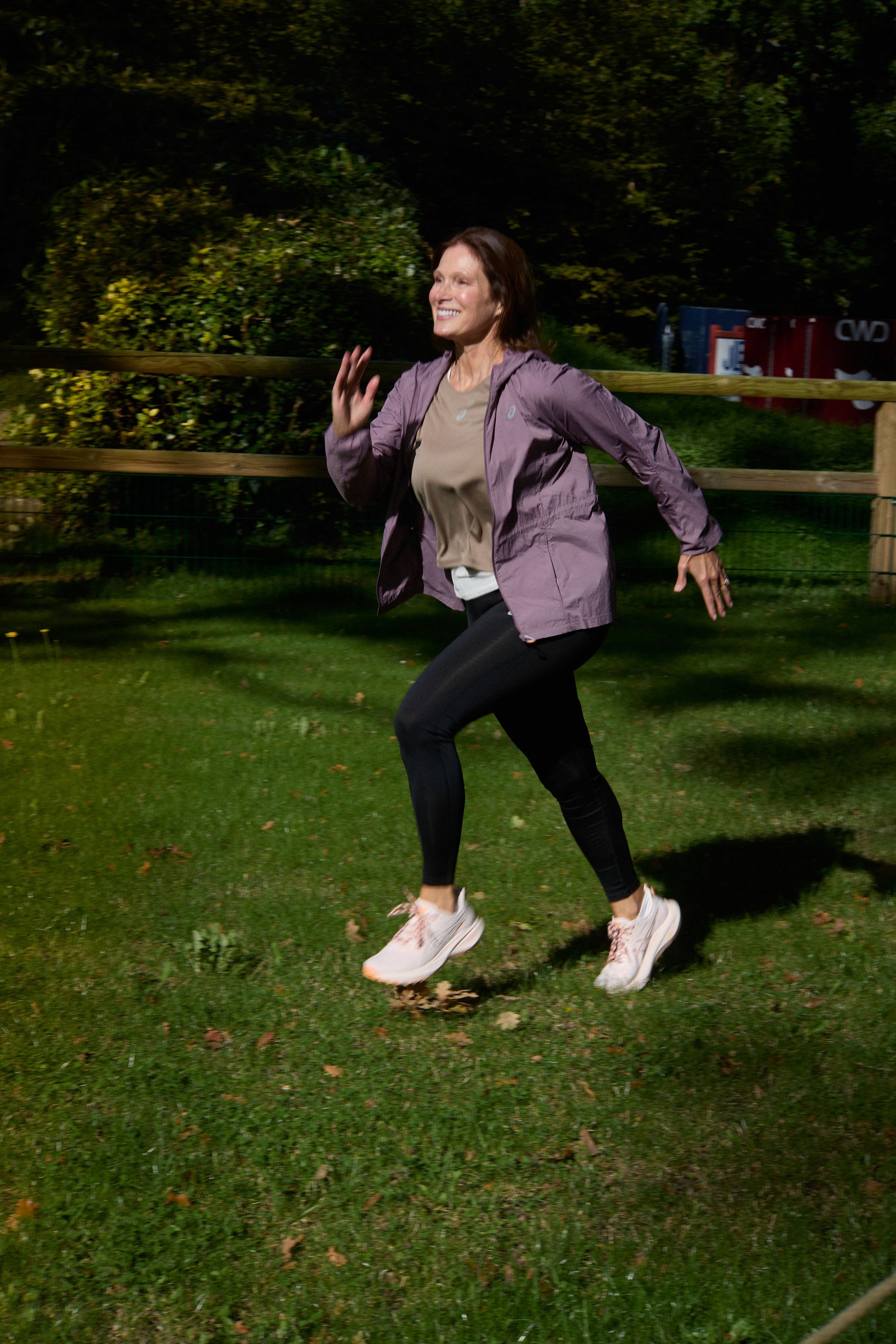 A bright yoga studio with a girl practicing gentle restorative yoga.