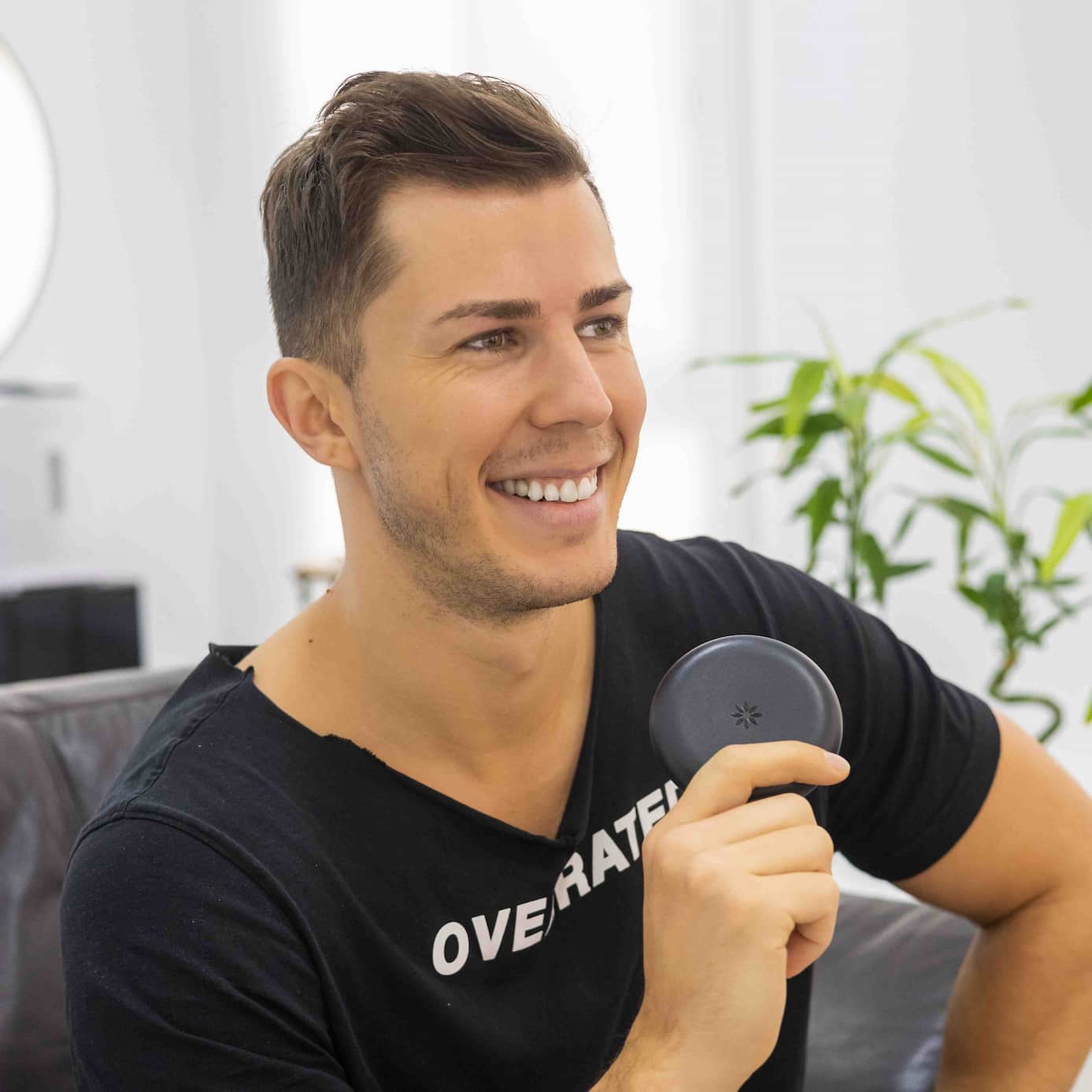 Patient smiling after completing Invisalign treatment