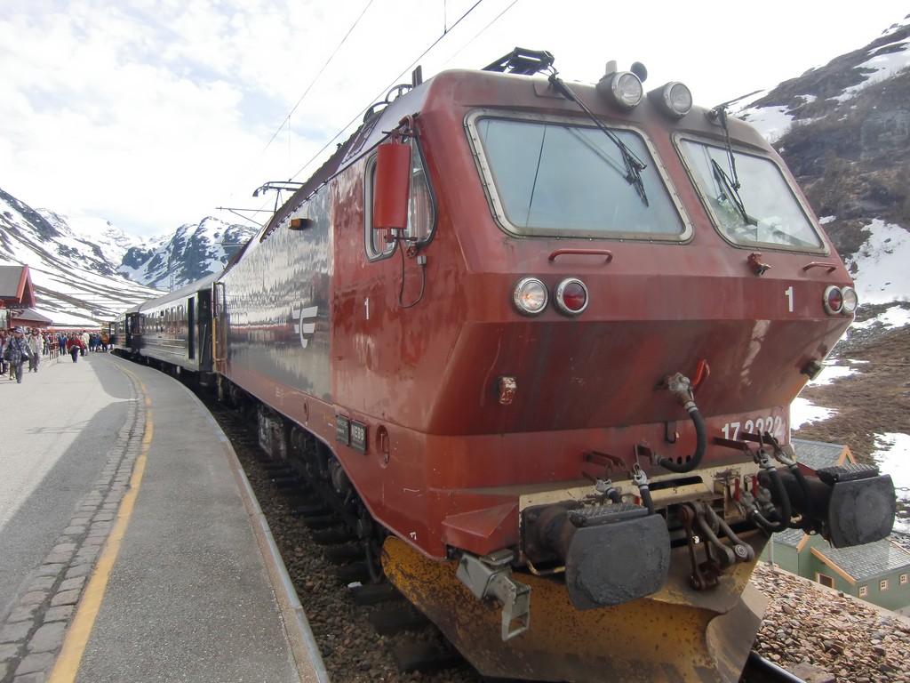 a train travels down the tracks