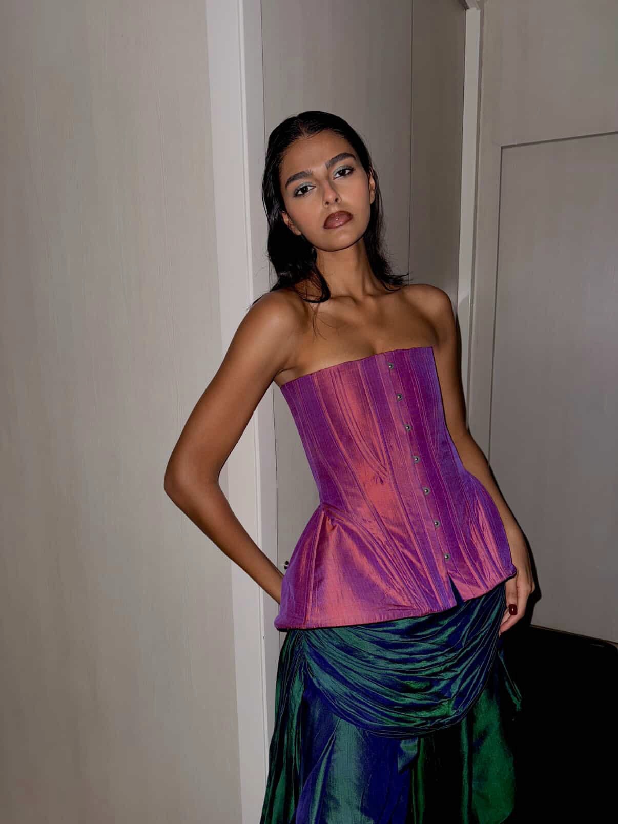 Kamal is a one-of-a-kind bell corset and skirt, handcrafted by skilled artisans in-house using a vintage emerald green silk saree. 