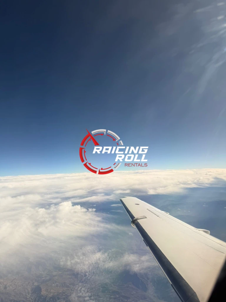 Black and white portrait of a smiling person with curly hair