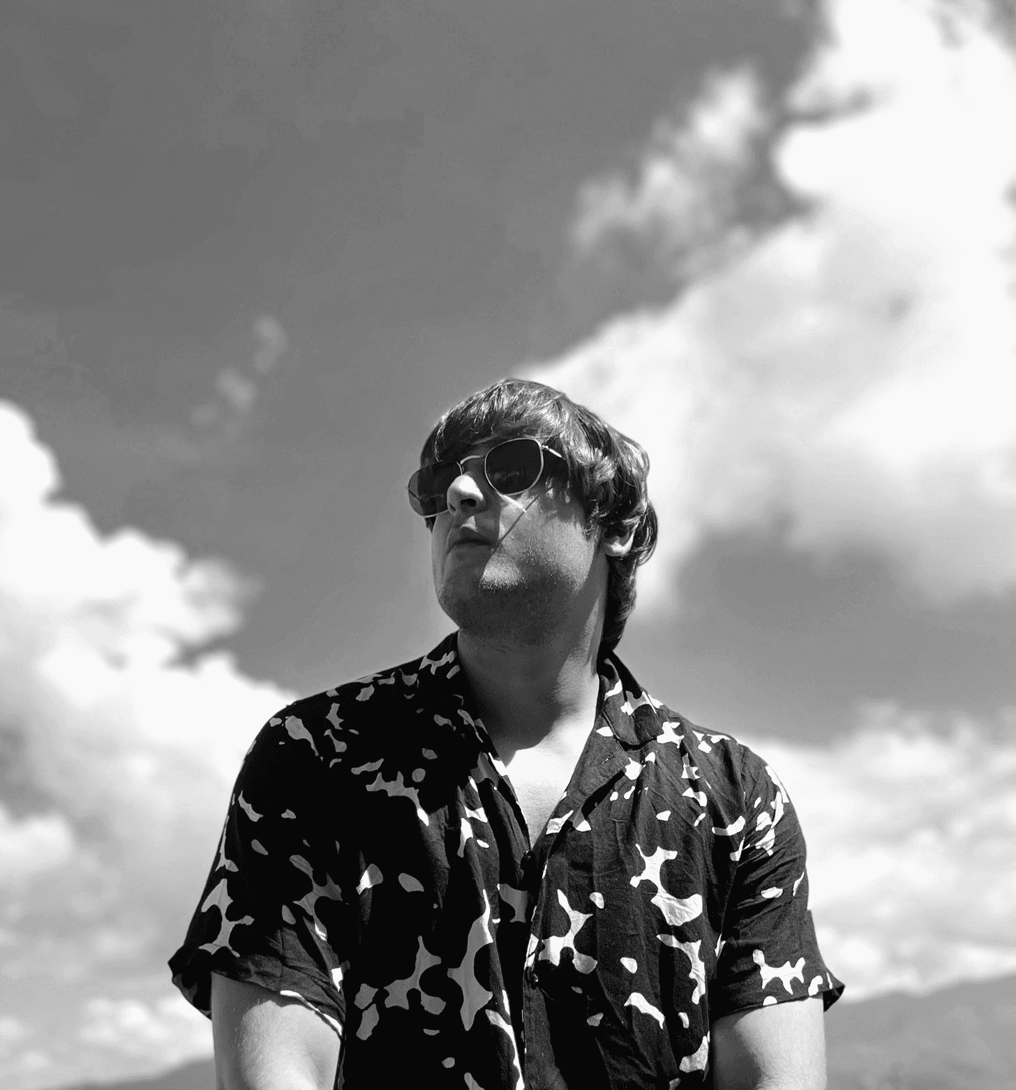 a blurry photo of a person standing in front of a wall