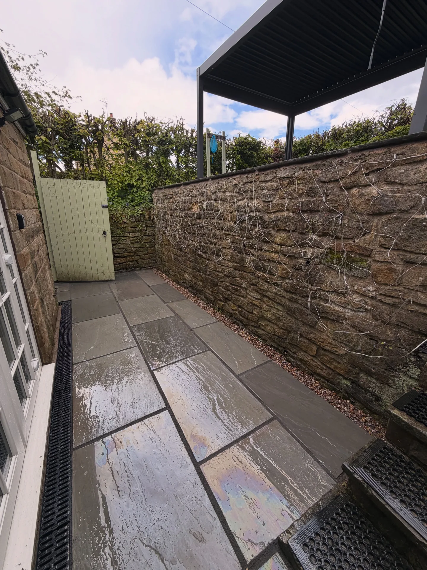 Finished Indian stone pathway leading towards the pergola in York
