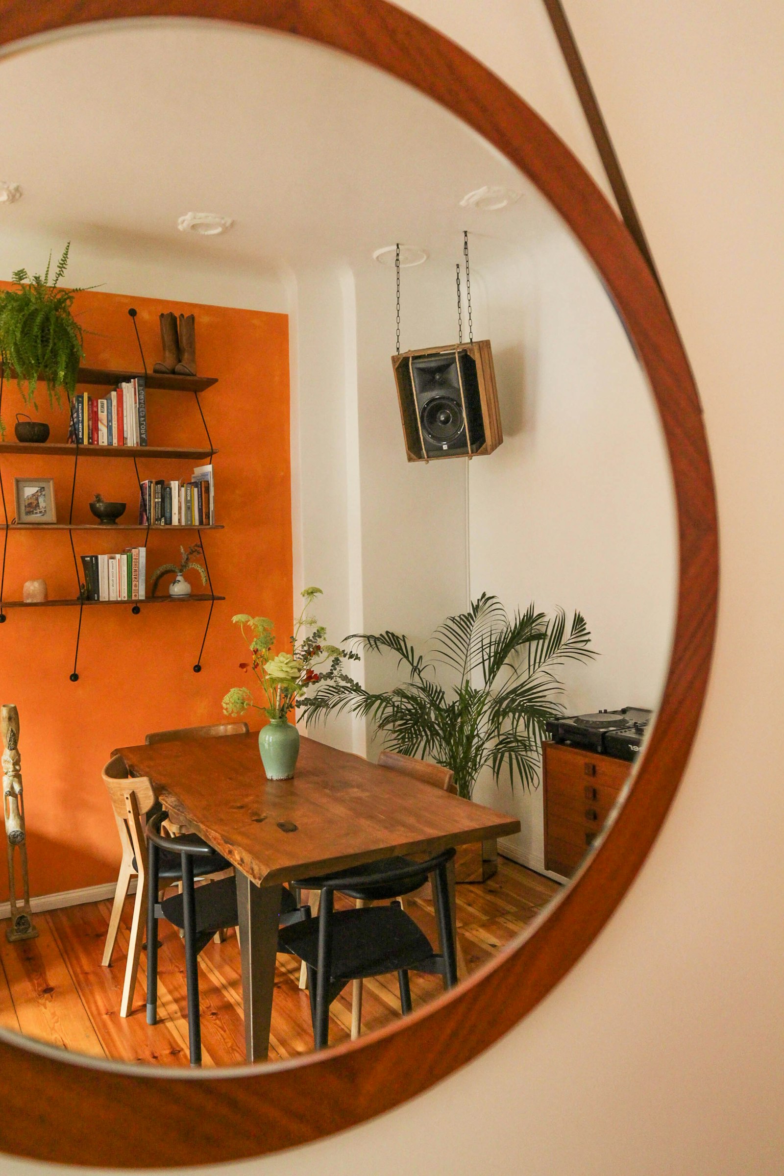 A calm dining room with a wooden table and chairs