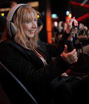 Person smiling while using the racing rigs