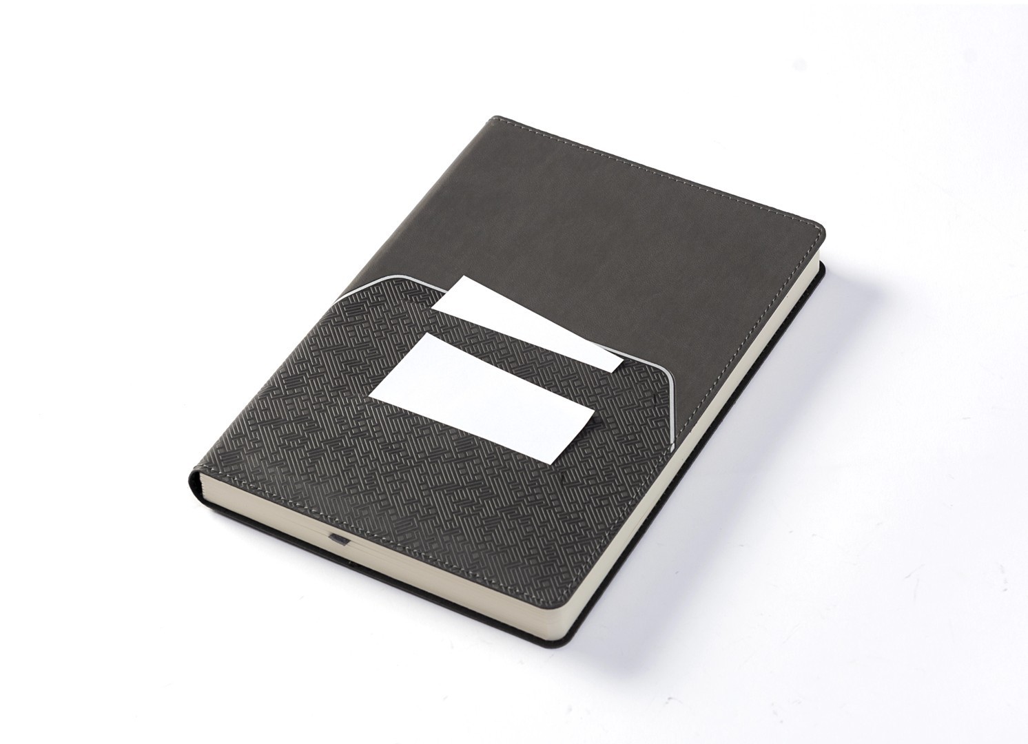 Angled view showing business cards inserted into the front cover slots.