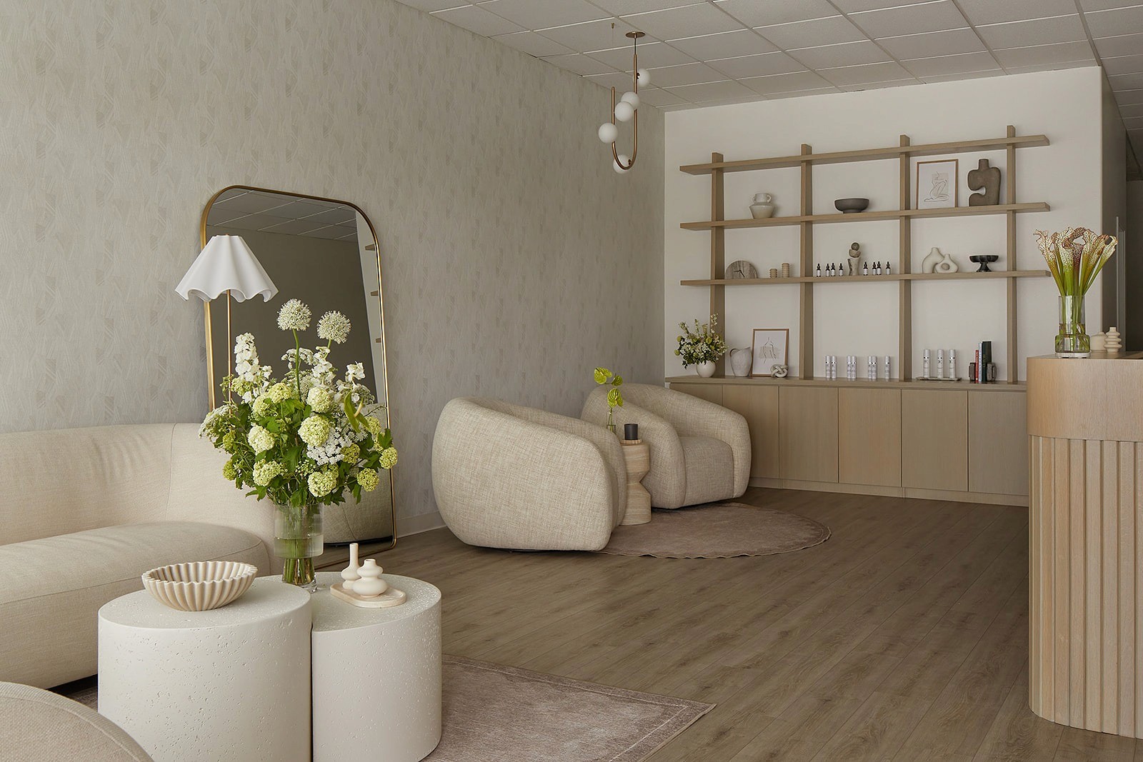 Custom millwork shelving and soft seating in a modern dermatology clinic waiting area.