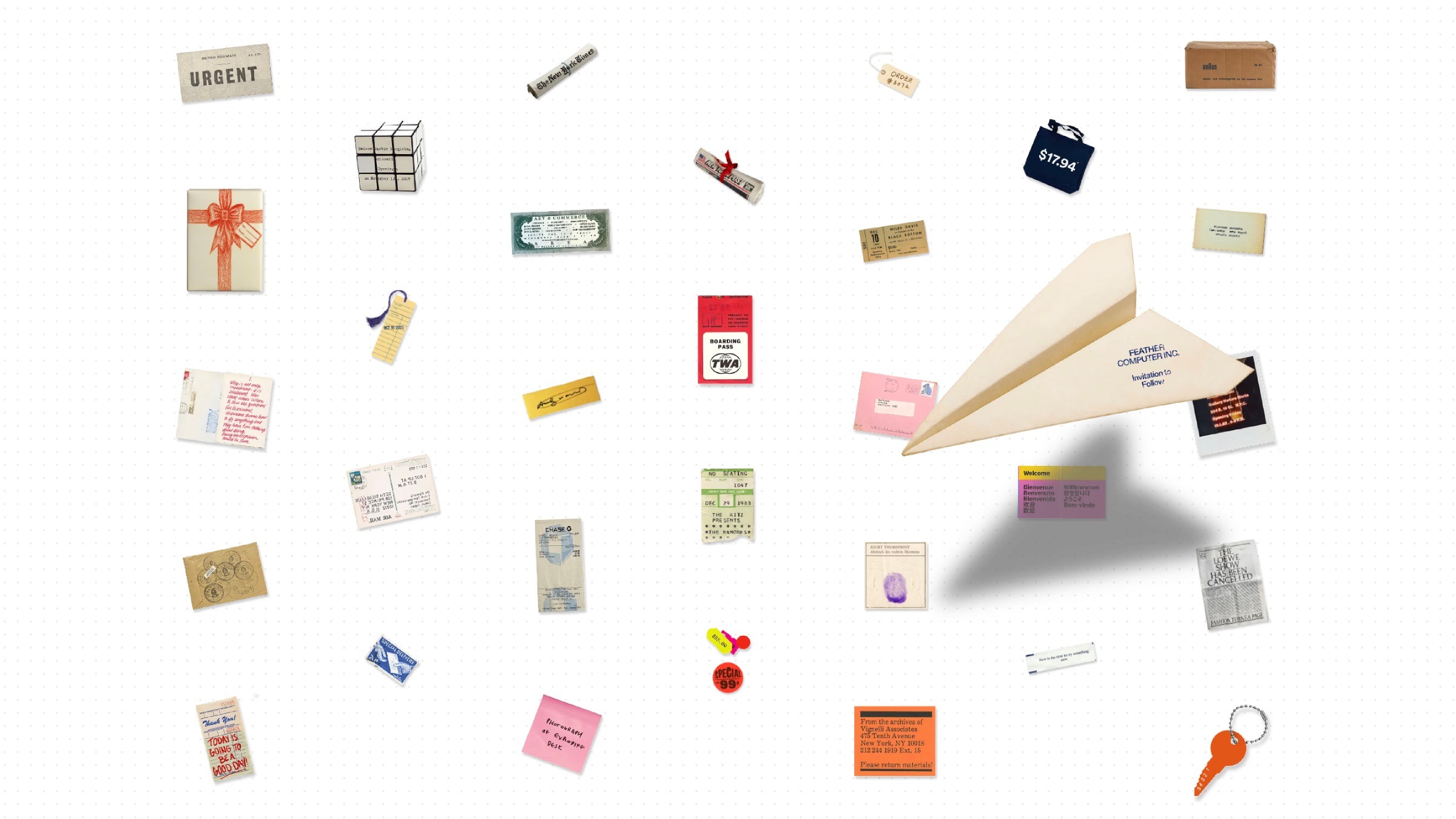 Paper plane surrounded by vintage notes and tags on white background