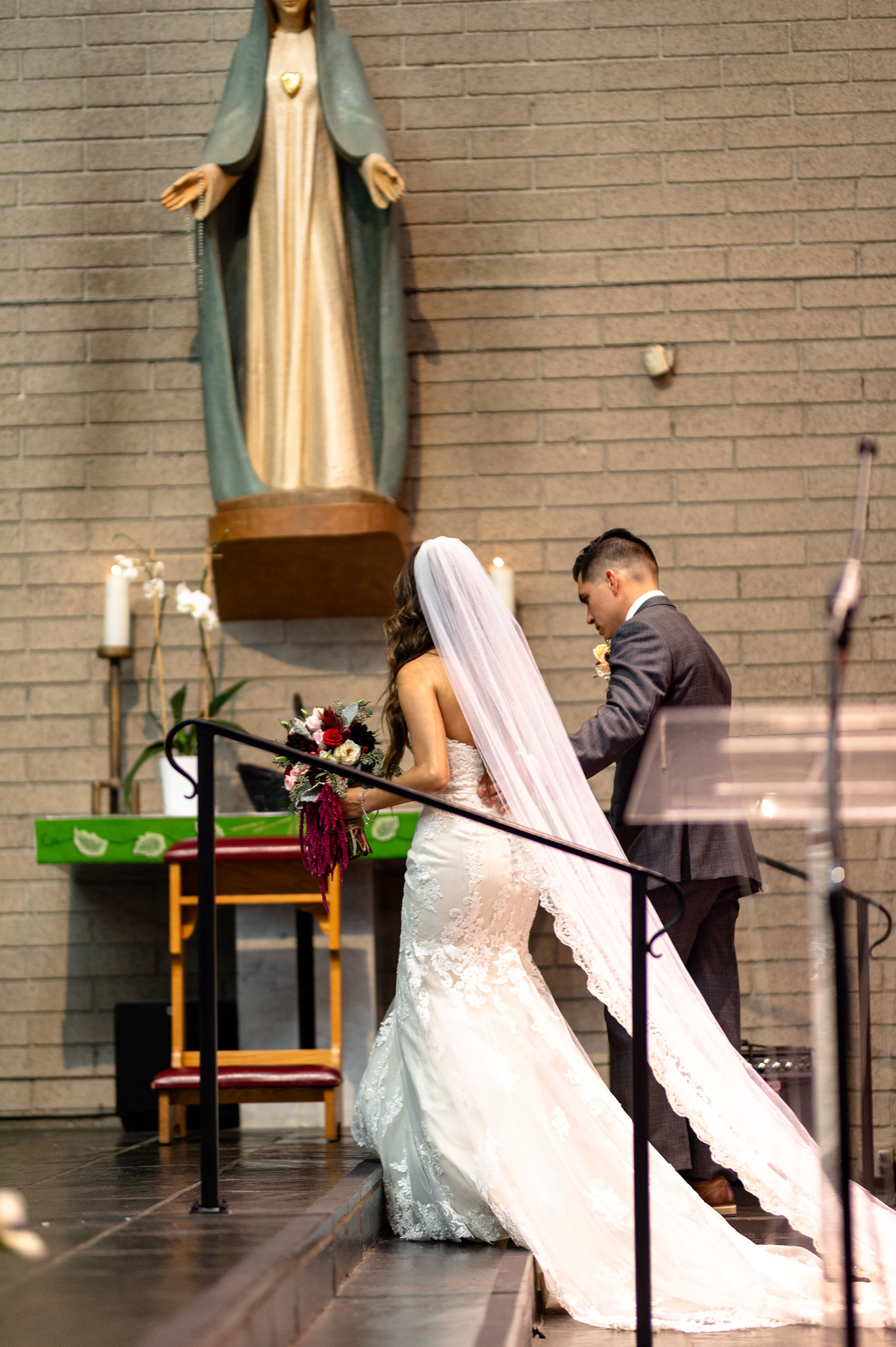 Flat lay wedding details with bouquet, rings, and sparkling bridal heels