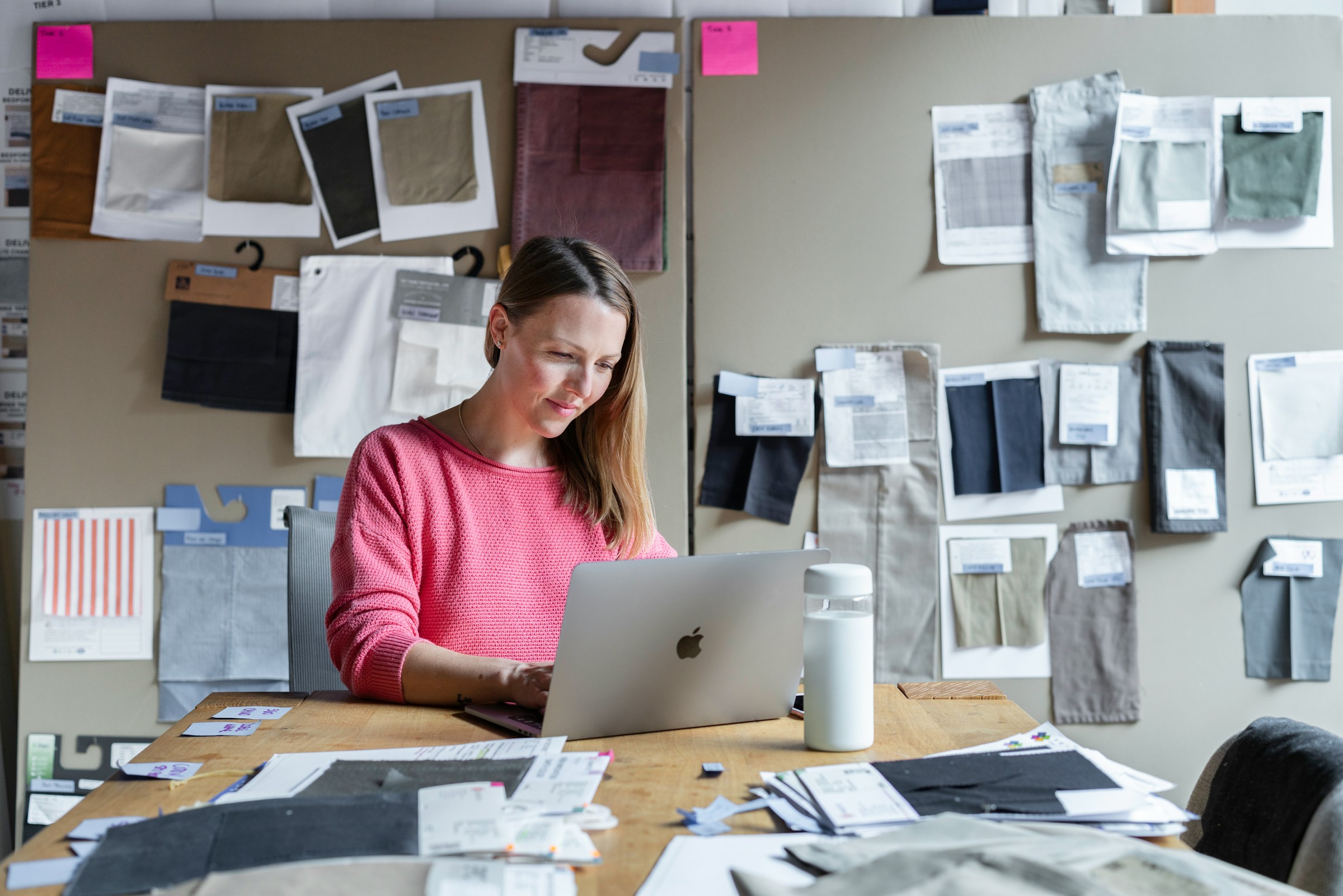 woman sitting and working - How To Cite AI In MLA